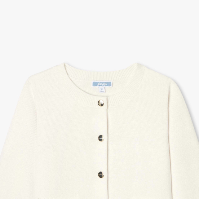 Trikotaj kardiqanlı qız uşağı