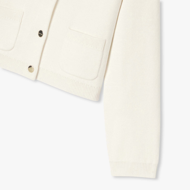 Trikotaj kardiqanlı qız uşağı